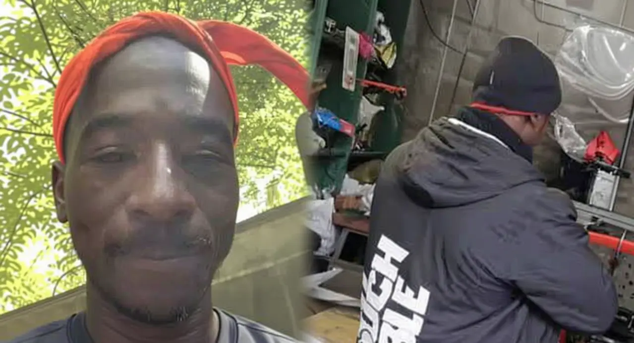 Uomo con bandana rossa in un ambiente esterno e di spalle in un'officina